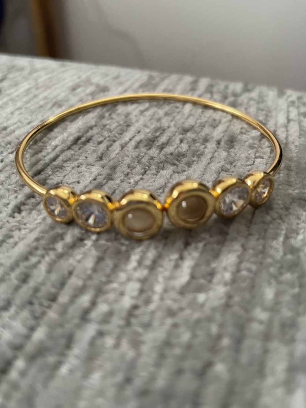 Gold Tone Women's Bangle Bracelet with 6 Clear and Colored Accent Stones